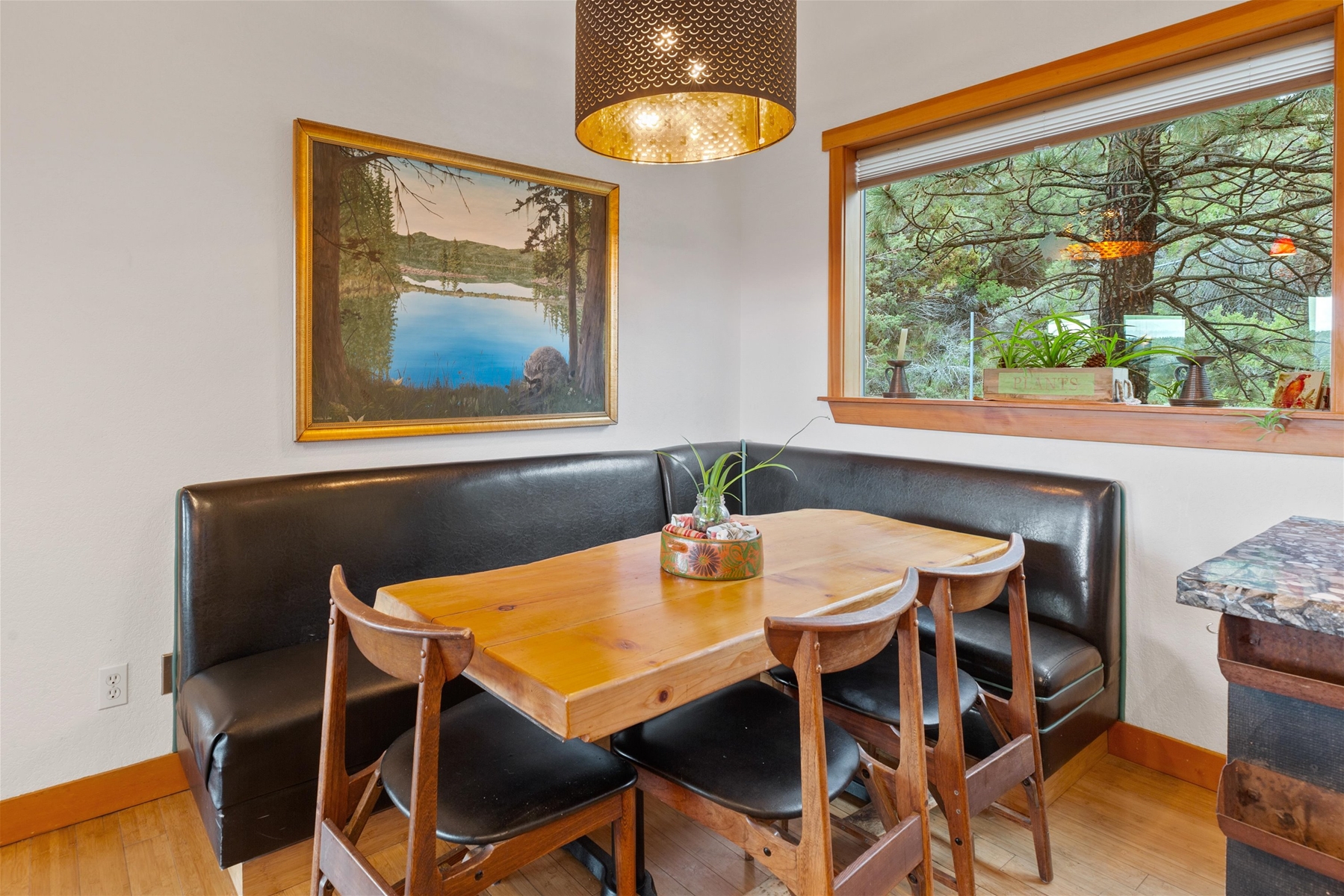 Breakfast nook with leather bench seating. 