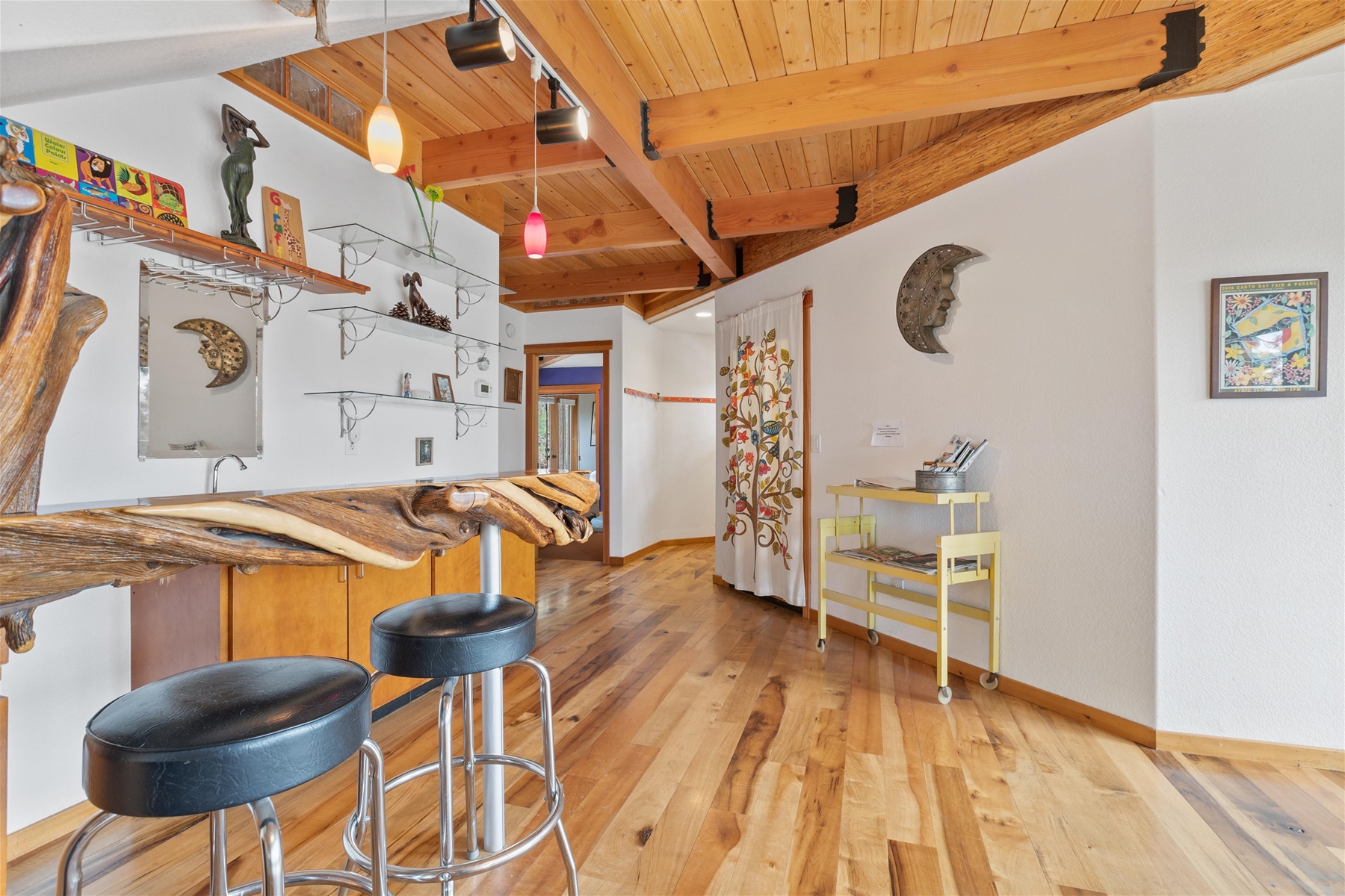 Twisted juniper wet bar with seating for two. 