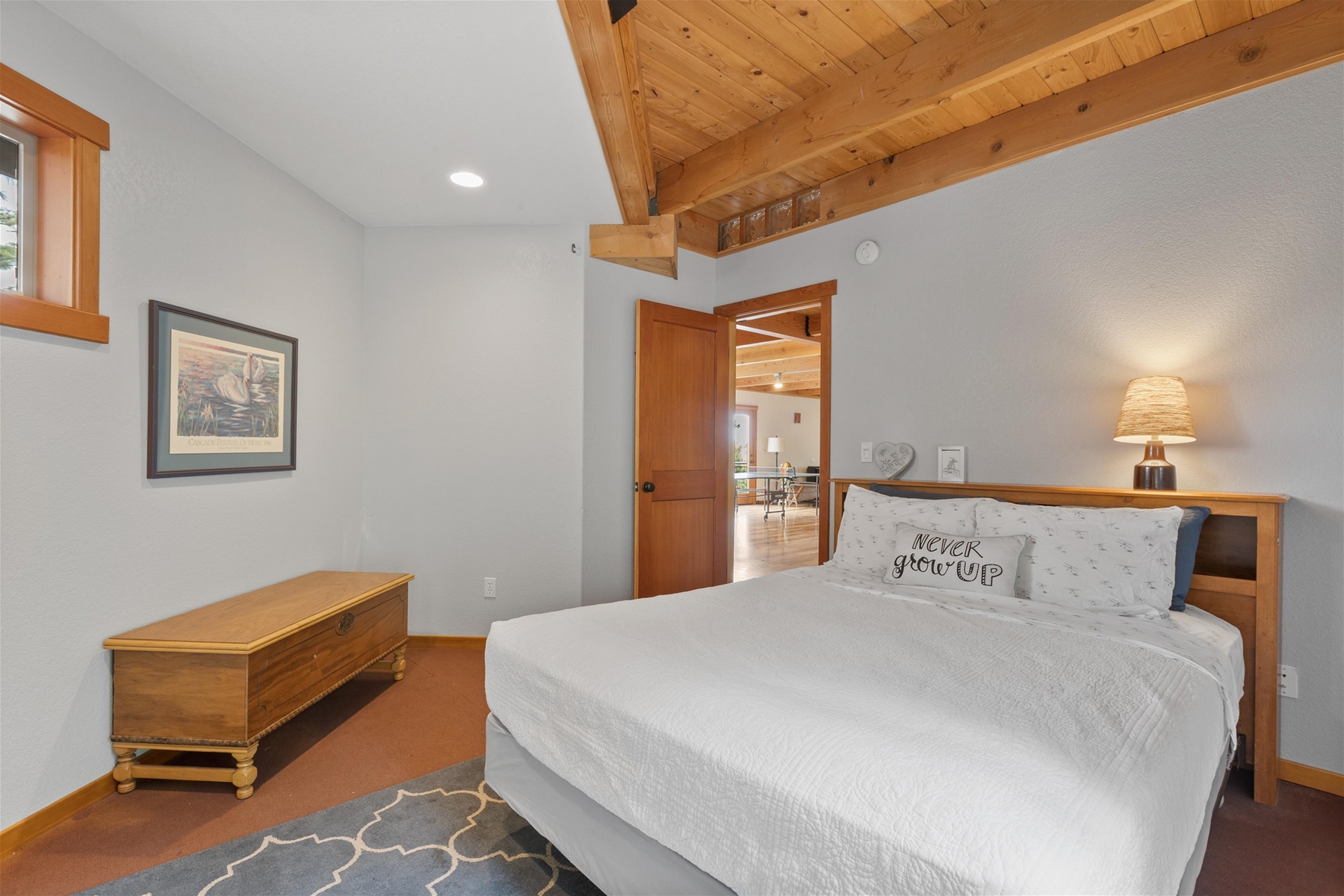 Bedroom #2: Queen guest room with bench seating and private entrance to patio.