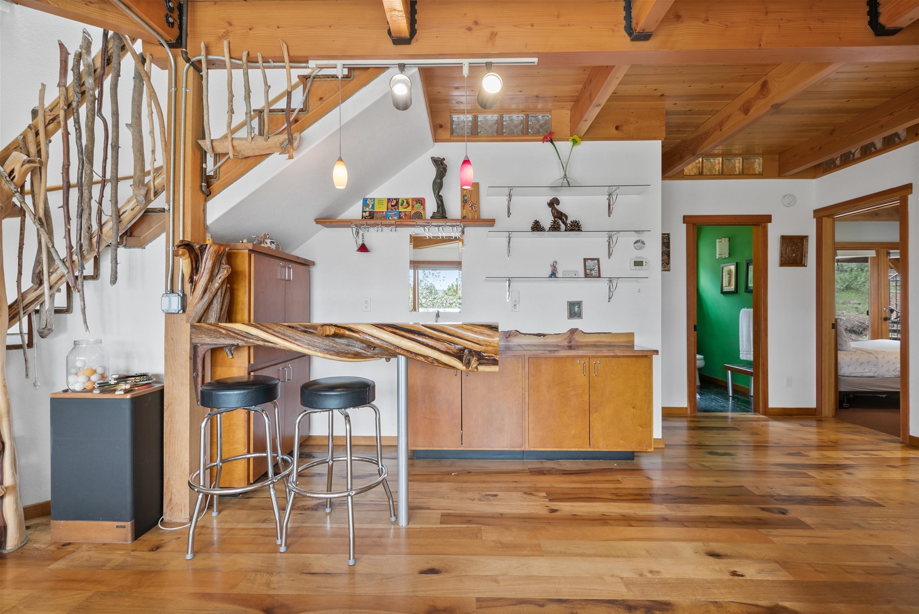 Twisted juniper wet bar with seating for two. 
