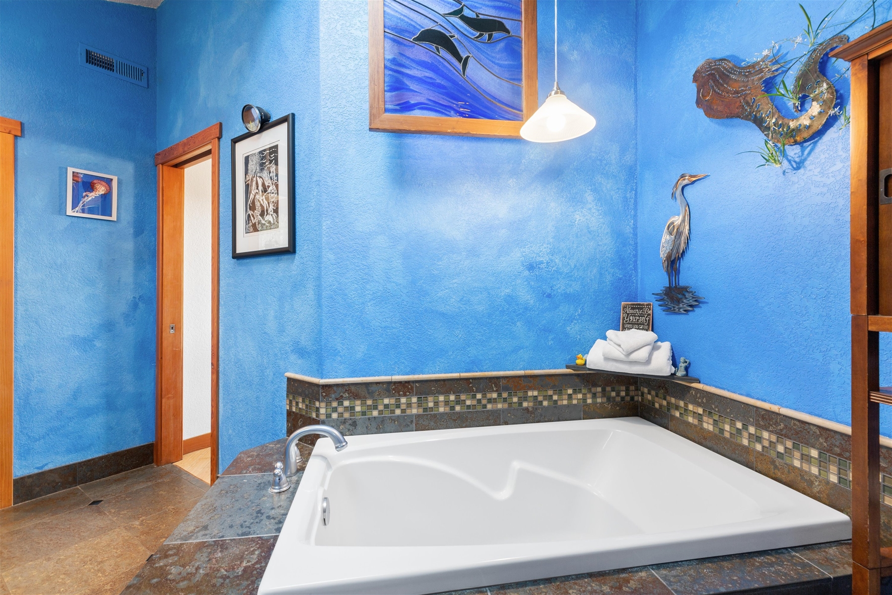 Queen main suite private bath with sunken tub and walk-in shower.