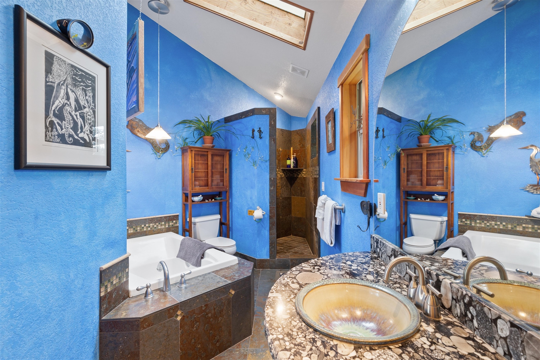 Queen main suite private bath with sunken tub and walk-in shower.