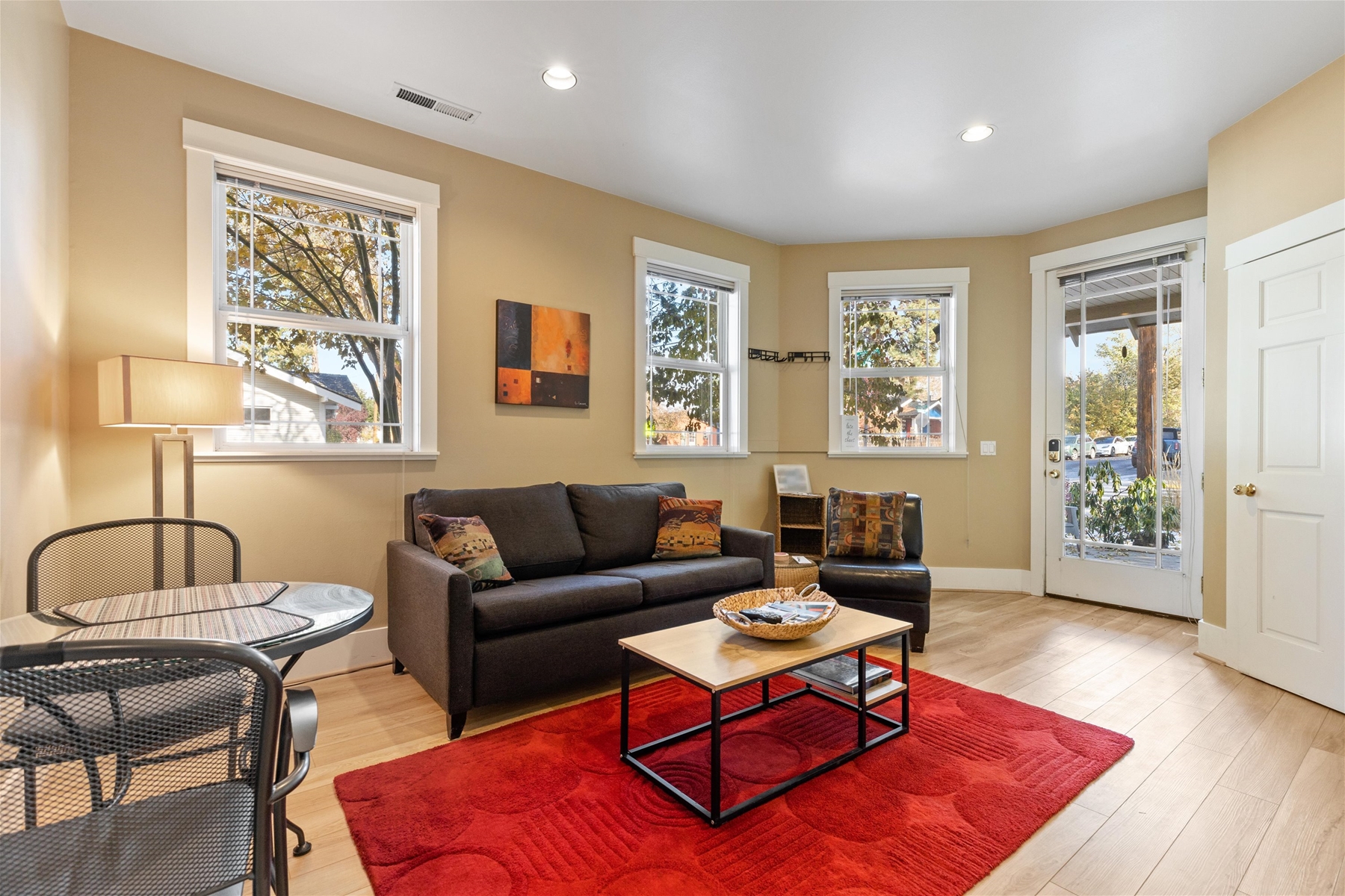 Living room area with smart TV and American Leather Sofa Sleeper.