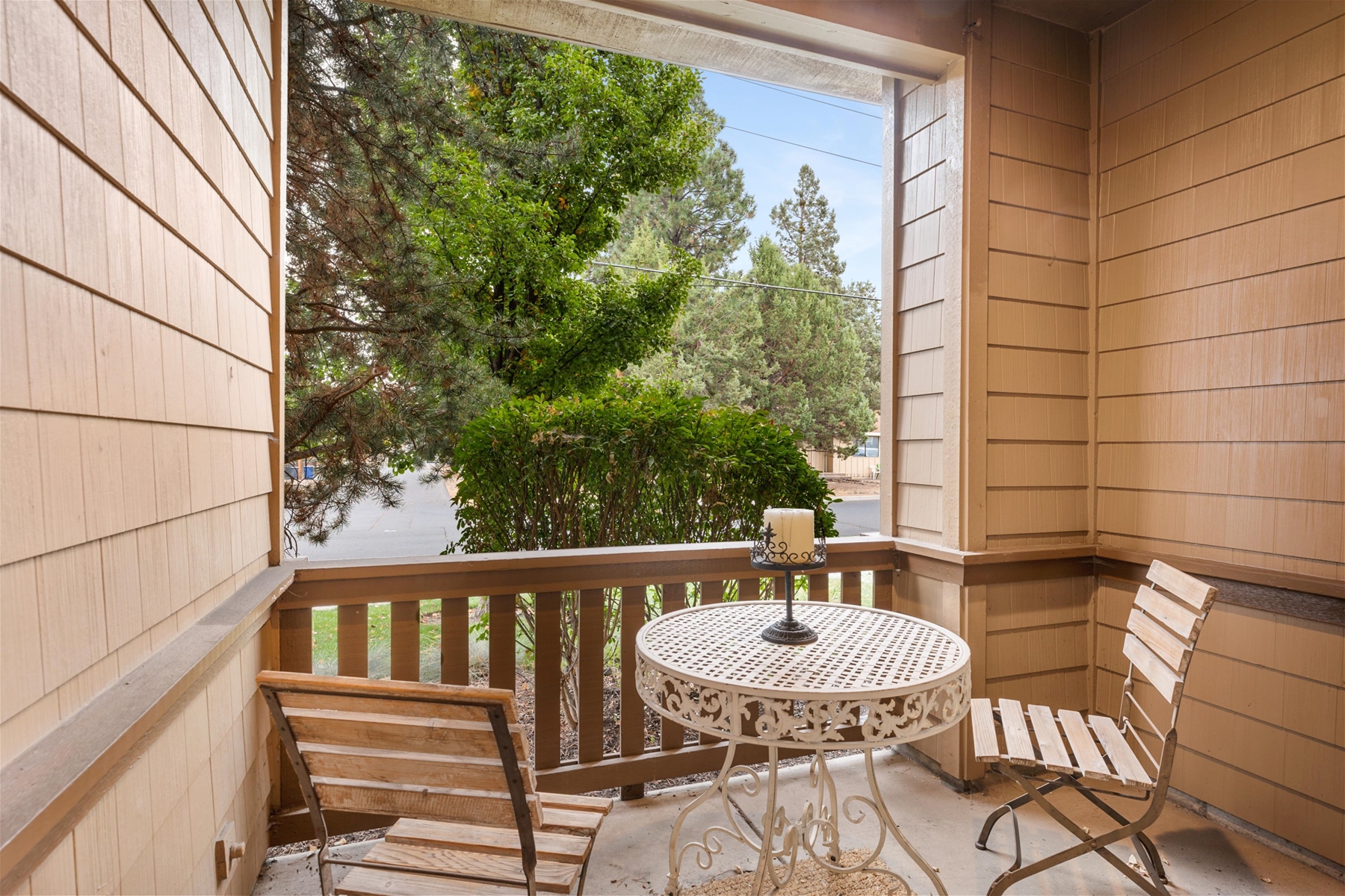 Private patio accessed through the guest queen bedroom – outdoor seating for 2 (lower level)