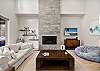 Spacious and inviting, the perfect spot to unwind after a day of adventure. Living room includes a gas fireplace and smart TV. 