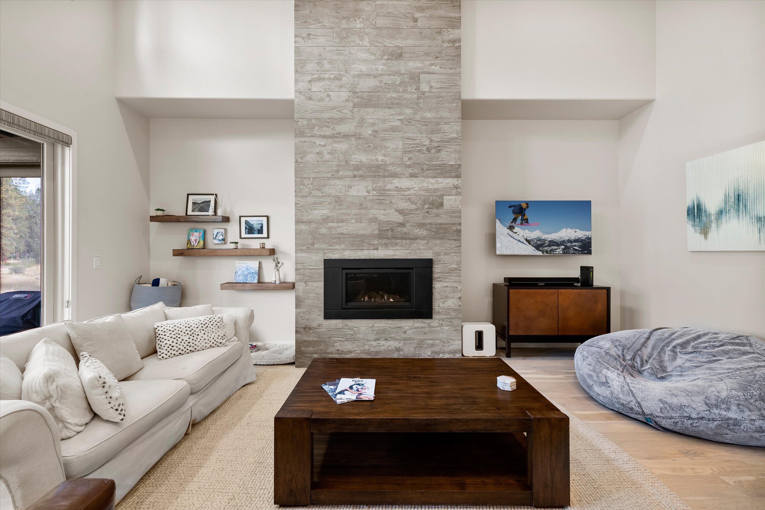 Spacious and inviting, the perfect spot to unwind after a day of adventure. Living room includes a gas fireplace and smart TV. 