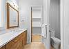 King main suite bathroom and walk-in closet (lower level).
