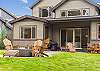 Gather around the gas firepit in the backyard and enjoy golf course views. 