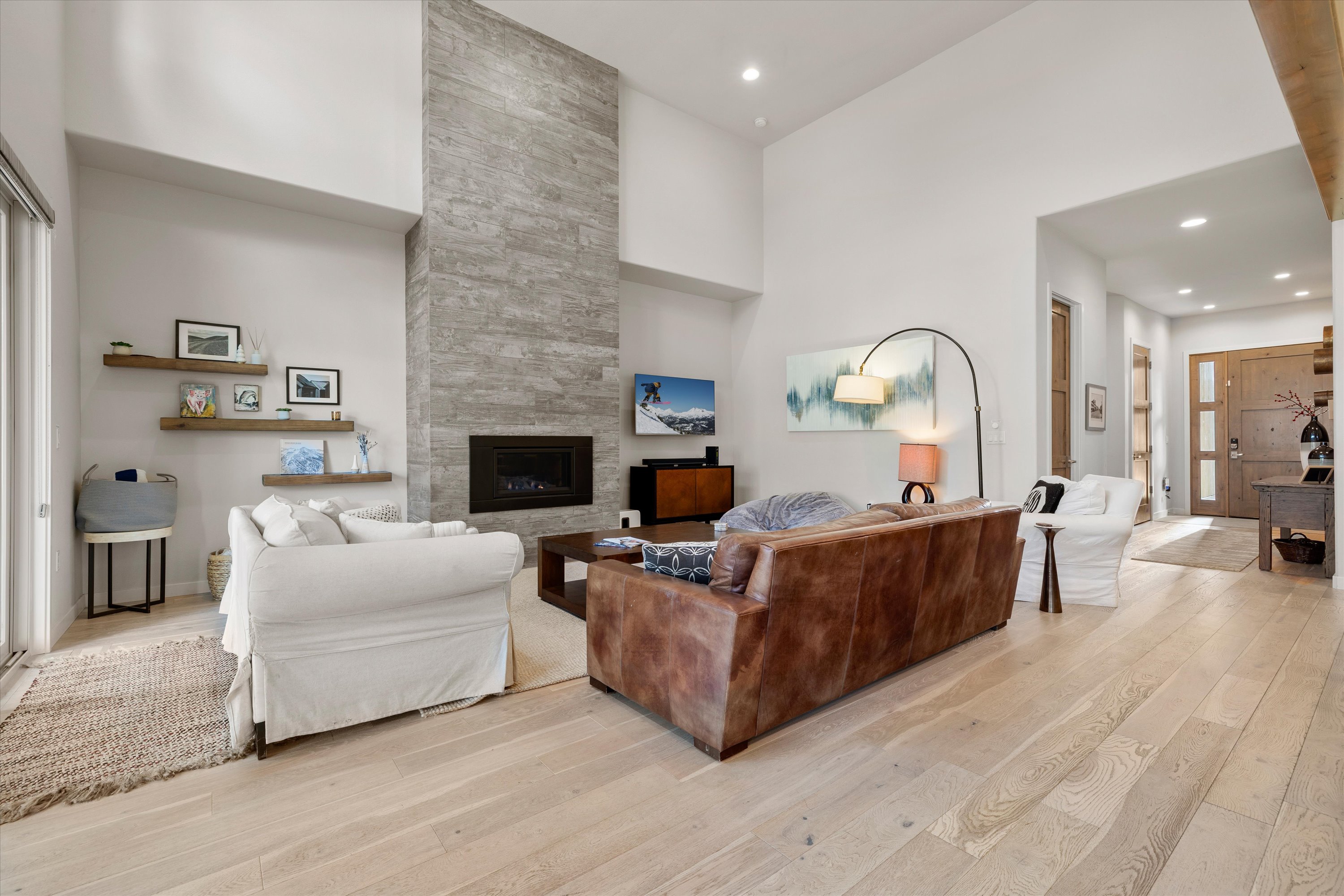 Spacious and inviting, the perfect spot to unwind after a day of adventure. Living room includes a gas fireplace and smart TV. 
