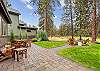 The backyard includes a patio, with outdoor dining seating for 6. 