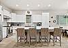 Breakfast bar seating for 4 and a beautifully designed kitchen. 