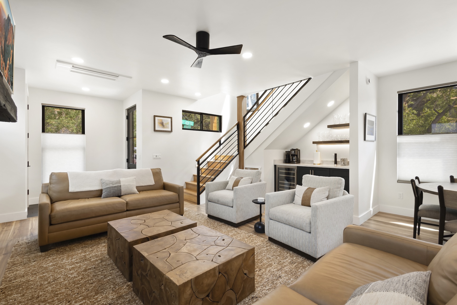 Our home is beautifully furnished and features high-end furnishings throughout, a cozy gas fireplace, a smart TV, a wet/coffee bar, and an open-concept living space.