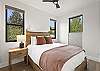 Our third bedroom features a queen bed, mountain views and a Smart TV.