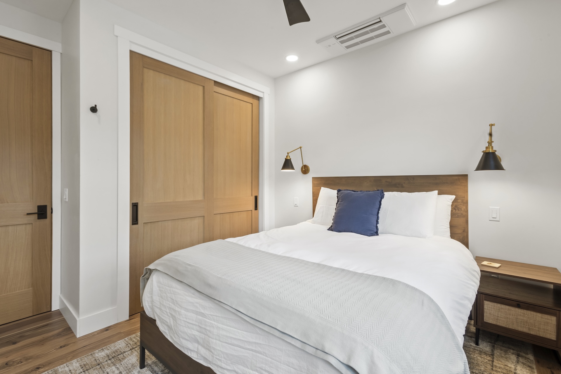Our second bedroom features a queen bed, mountain views and a Smart TV. 