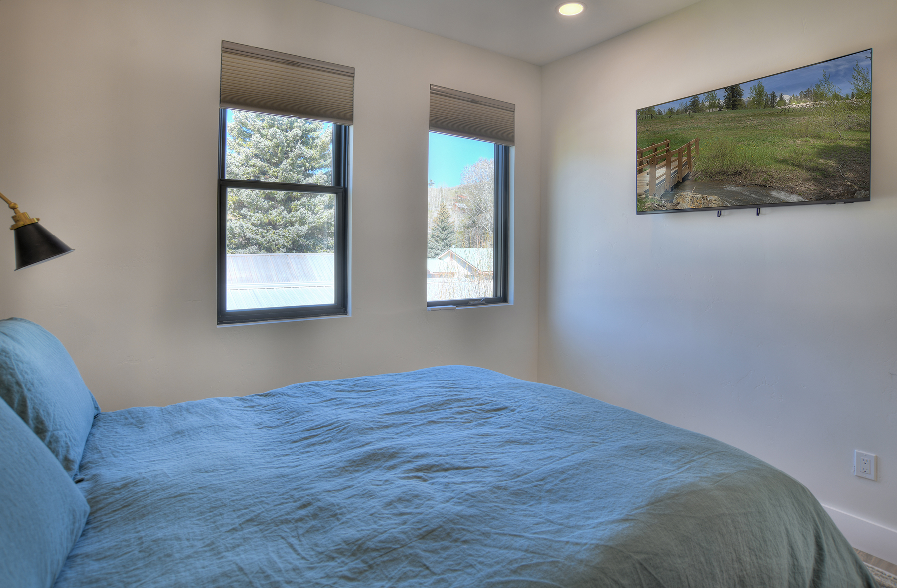 Relax and recharge in this cozy queen bedroom retreat. Beautiful views of the cliffs above Creede are right out the window!