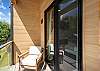 Enjoy sough facing mountain views, warm sunshine and privacy on your primary bedroom balcony. 