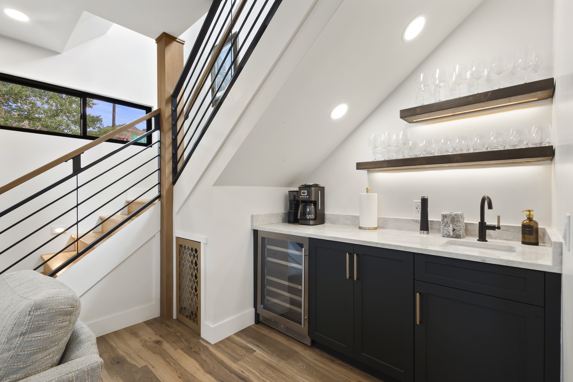Our home features a wet/coffee bar with wine fridge and bar sink. 