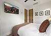 Our third bedroom features a queen bed, mountain views and a Smart TV.