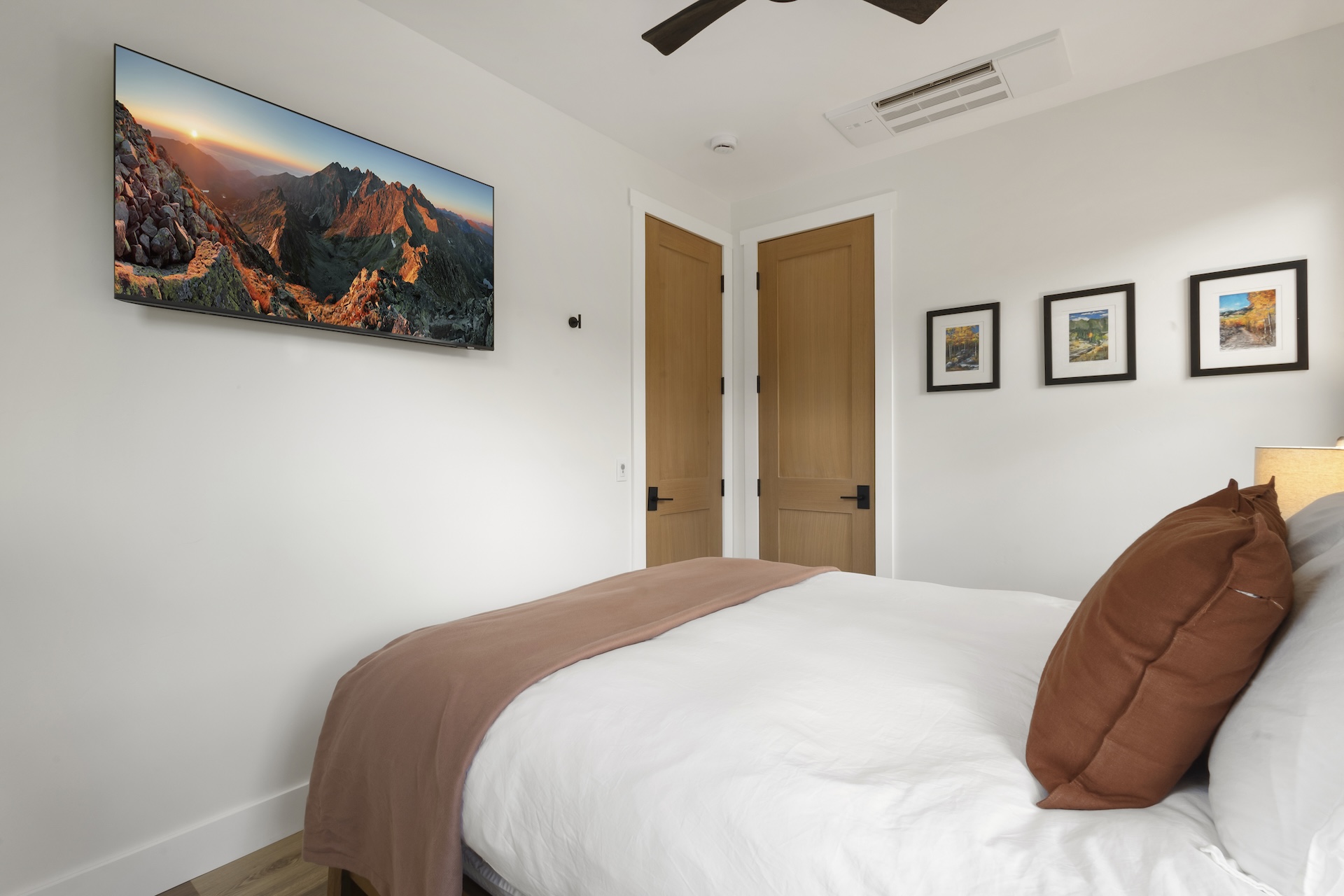 Our third bedroom features a queen bed, mountain views and a Smart TV.