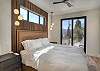 Unwind in this spacious king bedroom with an electric fireplace, Smart TV, and ensuite bathroom. 