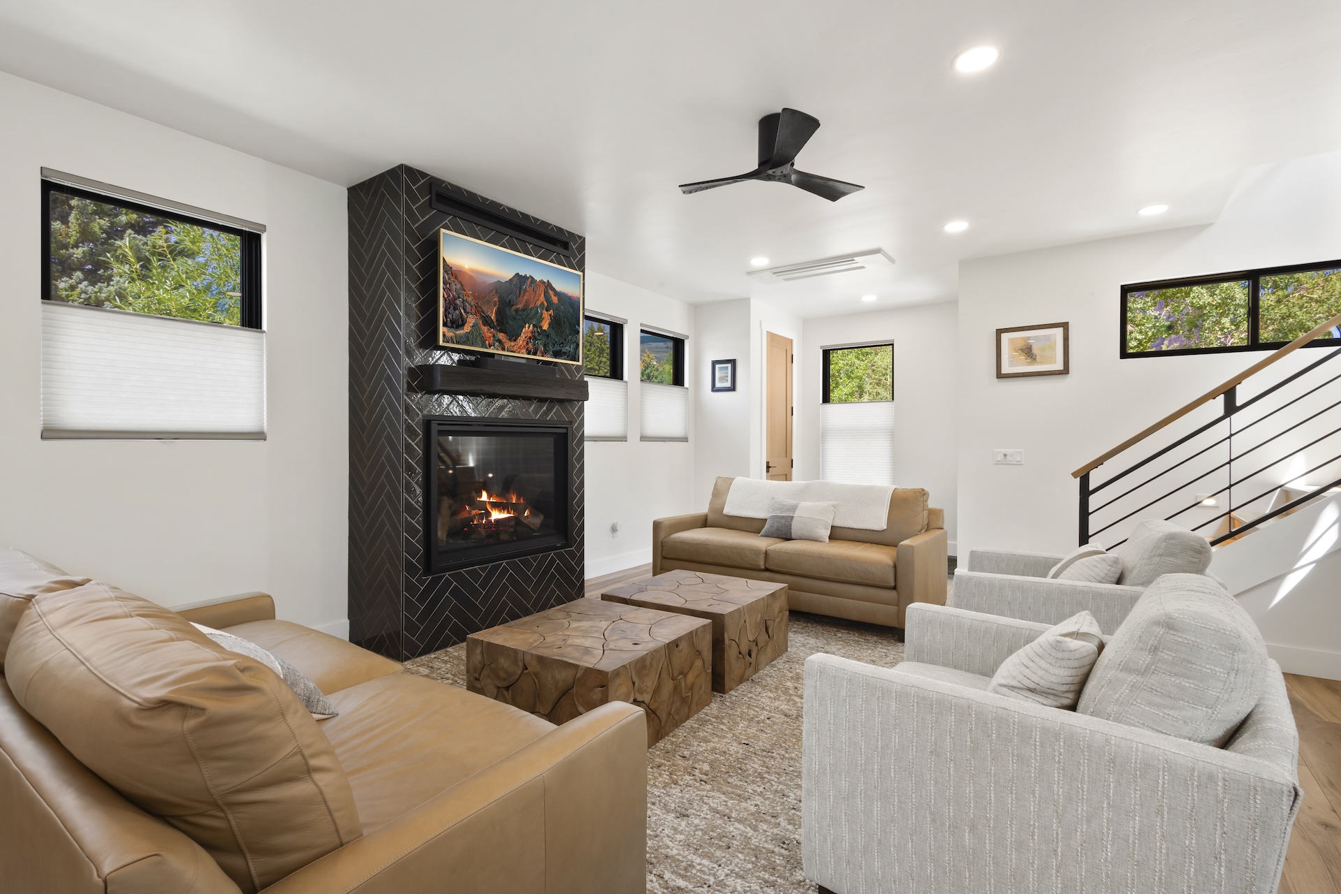 Our home is beautifully furnished and features high-end furnishings throughout, a cozy gas fireplace, a smart TV, a wet/coffee bar, and an open-concept living space.
