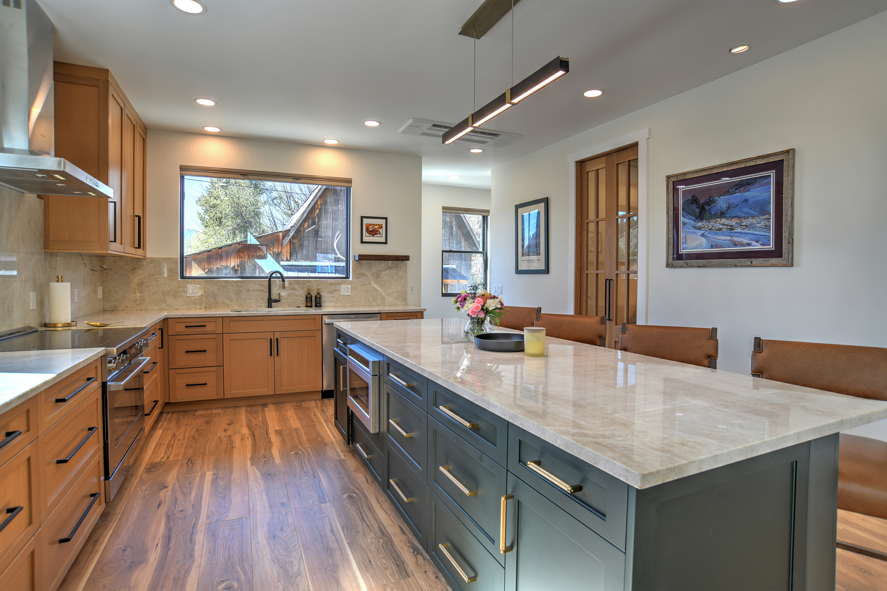 The stunning chef''s kitchen has everything you need to cook up a great meal, with a large island and bar seating for 4. 