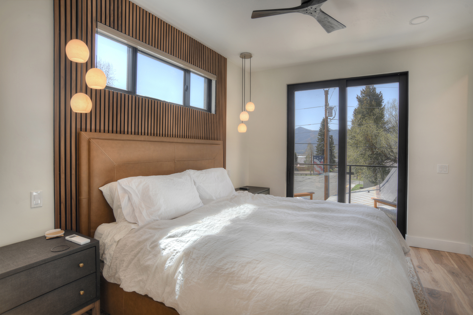 Unwind in this spacious king bedroom with an electric fireplace, Smart TV, and ensuite bathroom. 