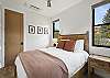 Our third bedroom features a queen bed, mountain views and a Smart TV.