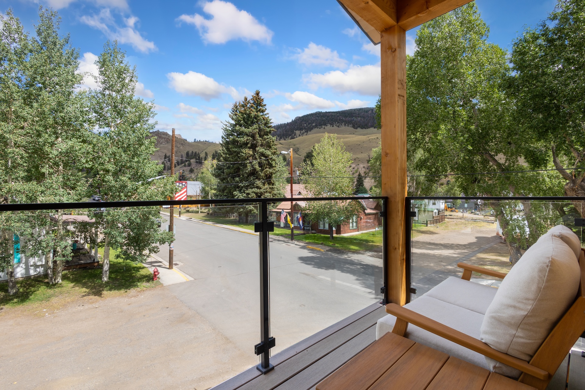 Enjoy the shared north facing balcony with views of the mountains, main street and the Creede Cliffs. 