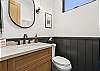 A convenient half-bath on the main level means no need to run upstairs during gatherings or after a day of mountain adventures.