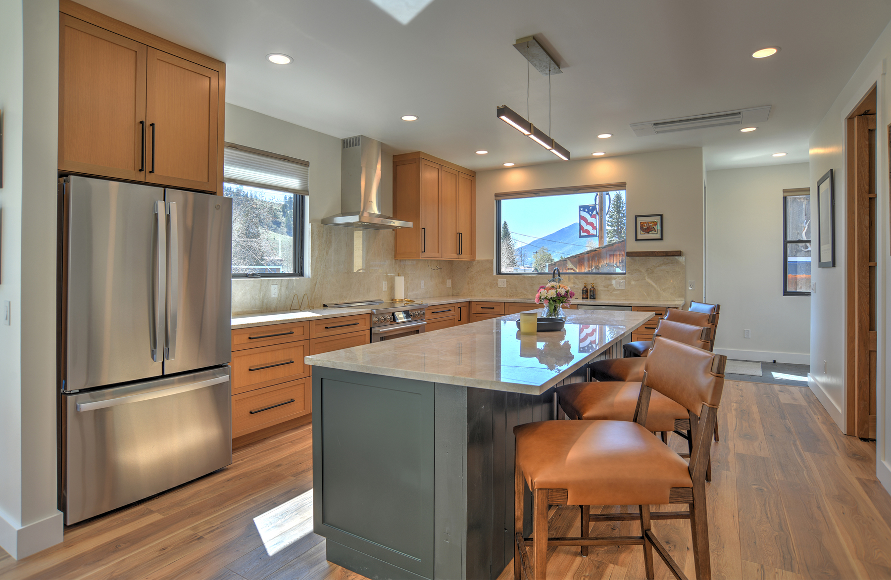 The stunning chef''s kitchen has everything you need to cook up a great meal, with a large island and bar seating for 4. 