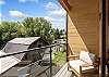 Our primary bedroom features a private south facing balcony. 