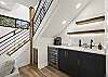Our home features a wet/coffee bar with wine fridge and bar sink. 