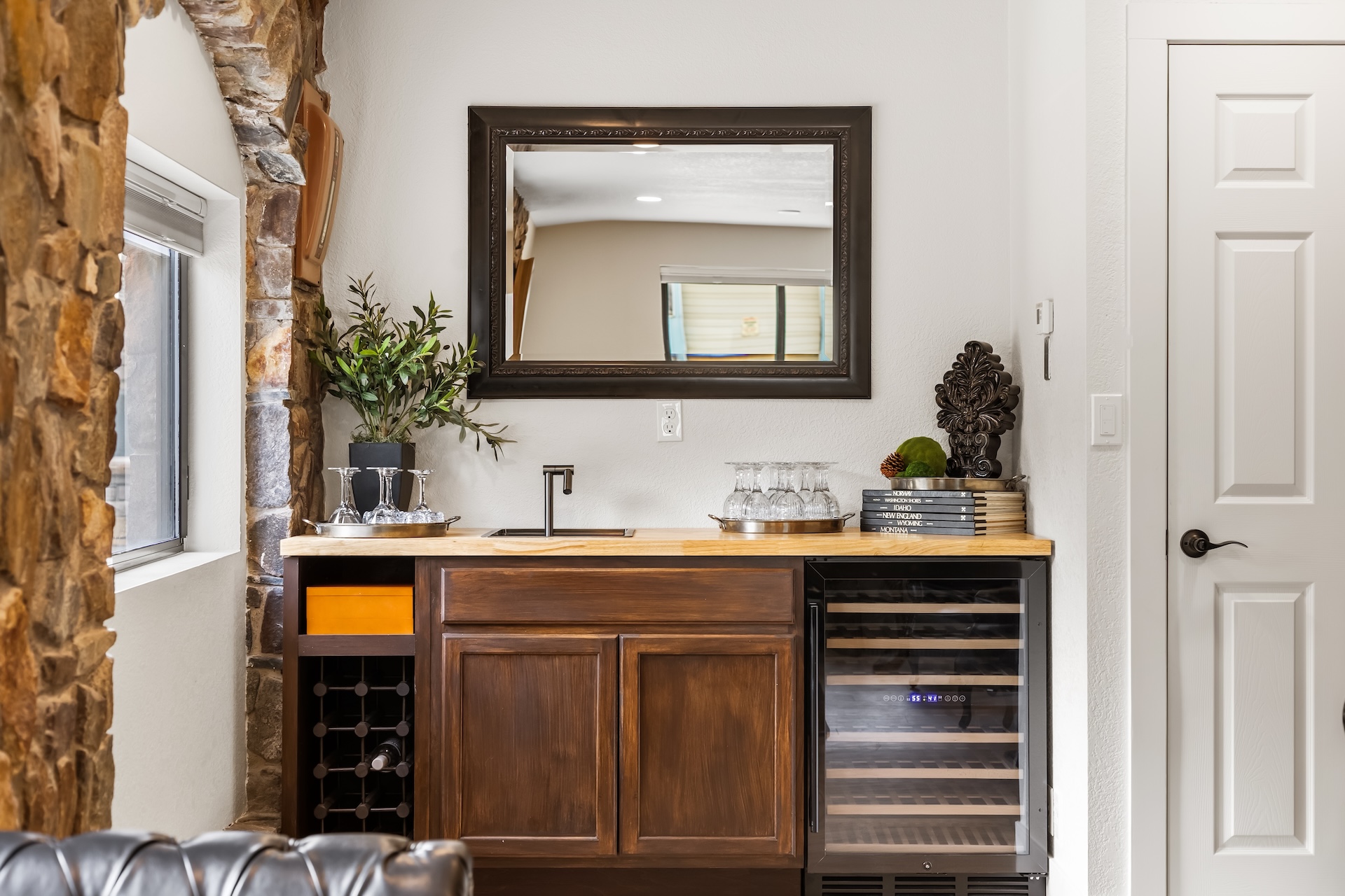Relax over a drink with family and friends in the wine room.