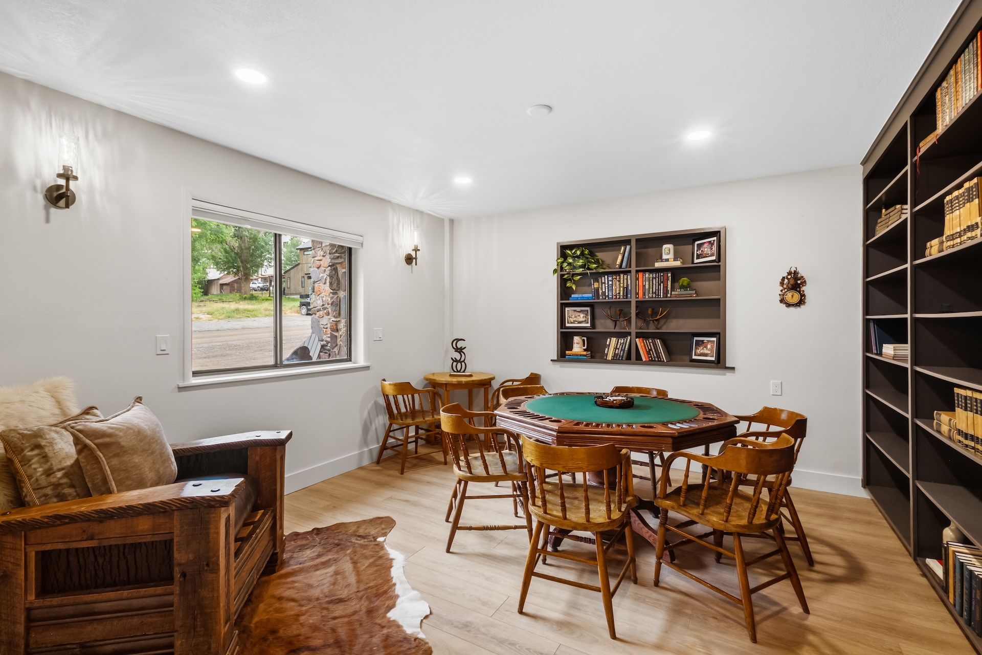 Gather around the poker table or curl up with a good book in the game room/library.