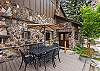 Lower side deck with outdoor dining space for 6 and mountain views.