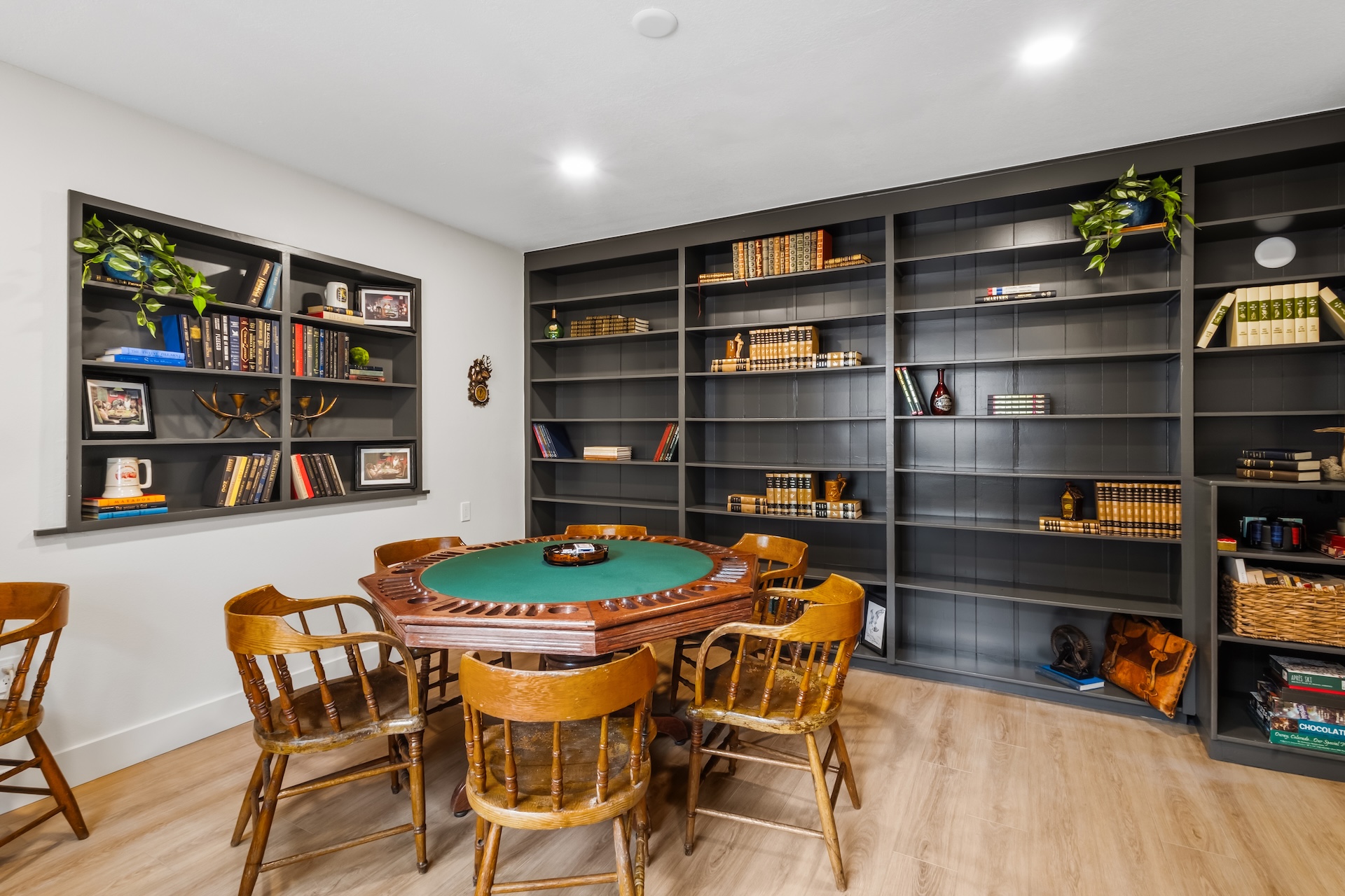 Gather around the poker table or curl up with a good book in the game room/library.