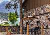 Lower side deck with outdoor dining space for 6 and mountain views.