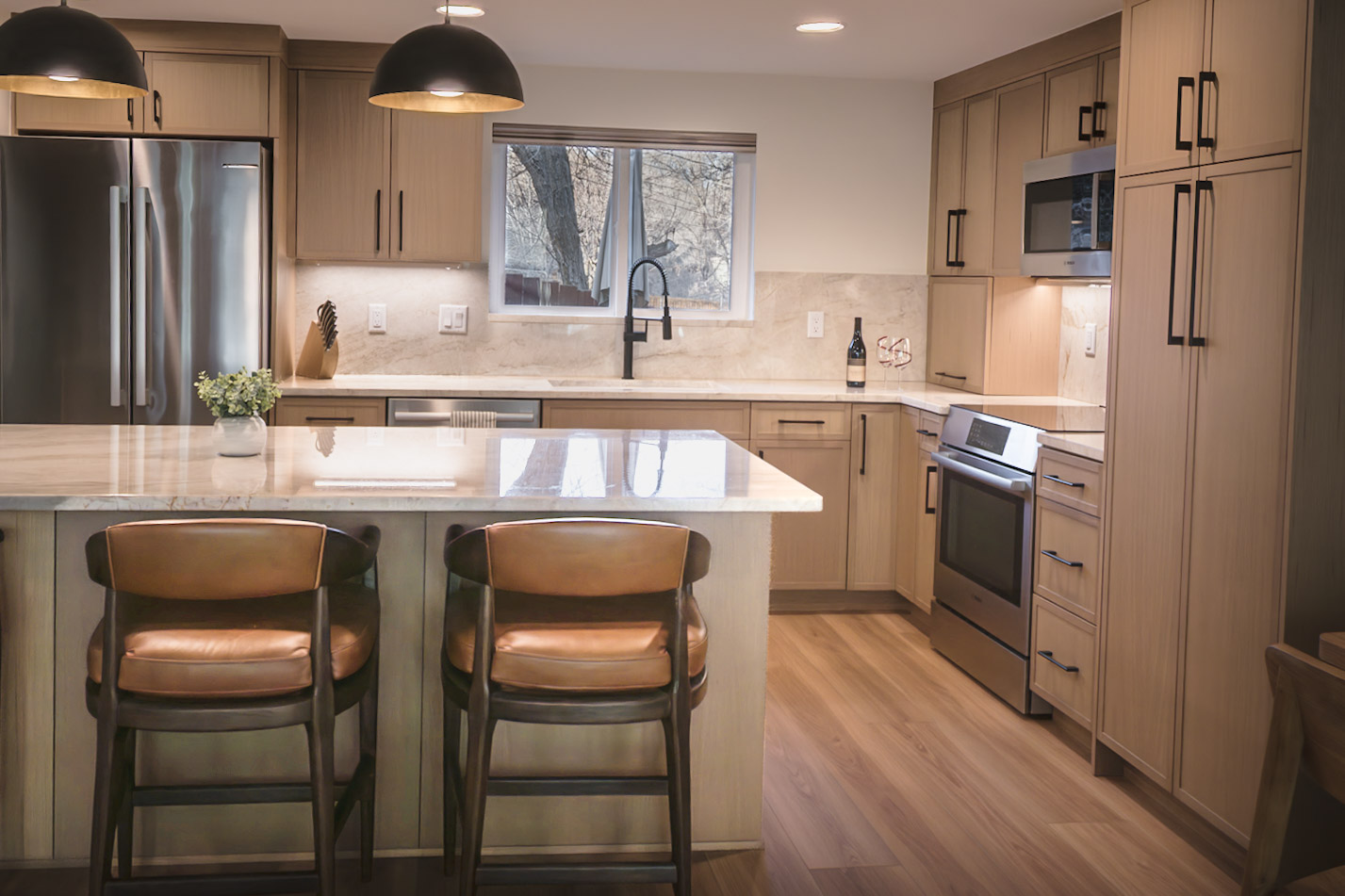 Beautifully designed kitchen and living area with breakfast bar seating for 3 people and dining seating for 4. 