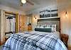 Relax and recharge in this cozy queen bedroom retreat.