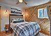 Relax and recharge in this cozy queen bedroom retreat.