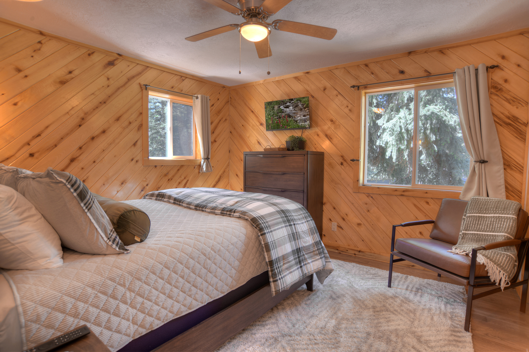 Relax and recharge in this cozy queen bedroom retreat.