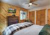 Relax and recharge in this cozy queen bedroom retreat.