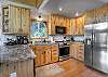 Whip up your favorite meals in this beautifully designed kitchen