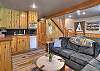 The downstairs area is complete with billiards, ping pong, a puzzle table, big screen TV, and popcorn machine for movie night. 