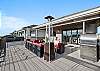 Enjoy a drink around the firepit or fire up the grill and pizza stove located on the rooftop balcony.