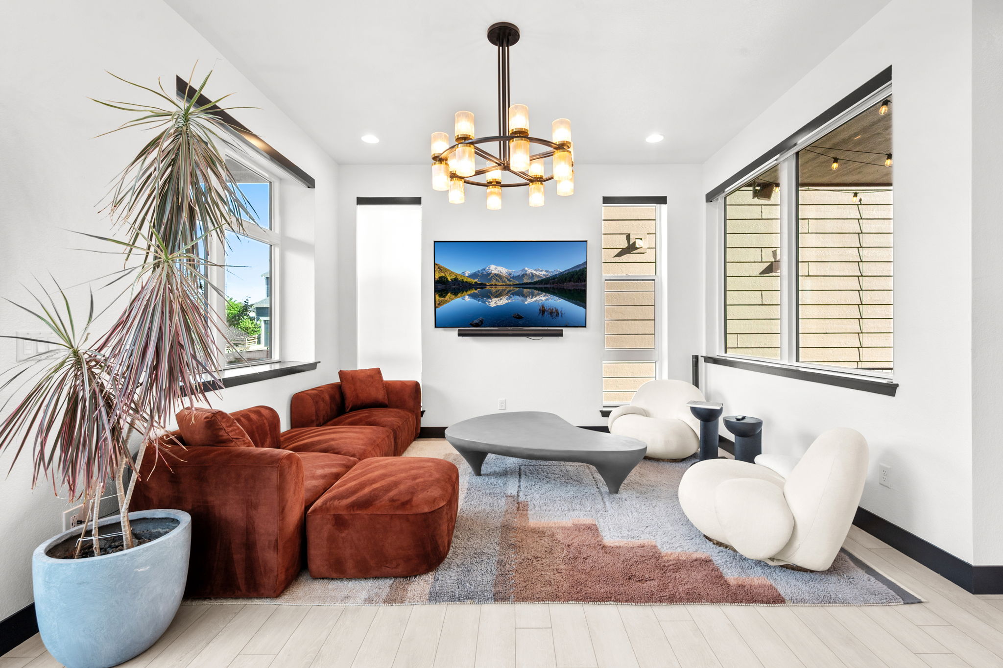 As soon as you enter the home, you are greeted by a designer living room area. 