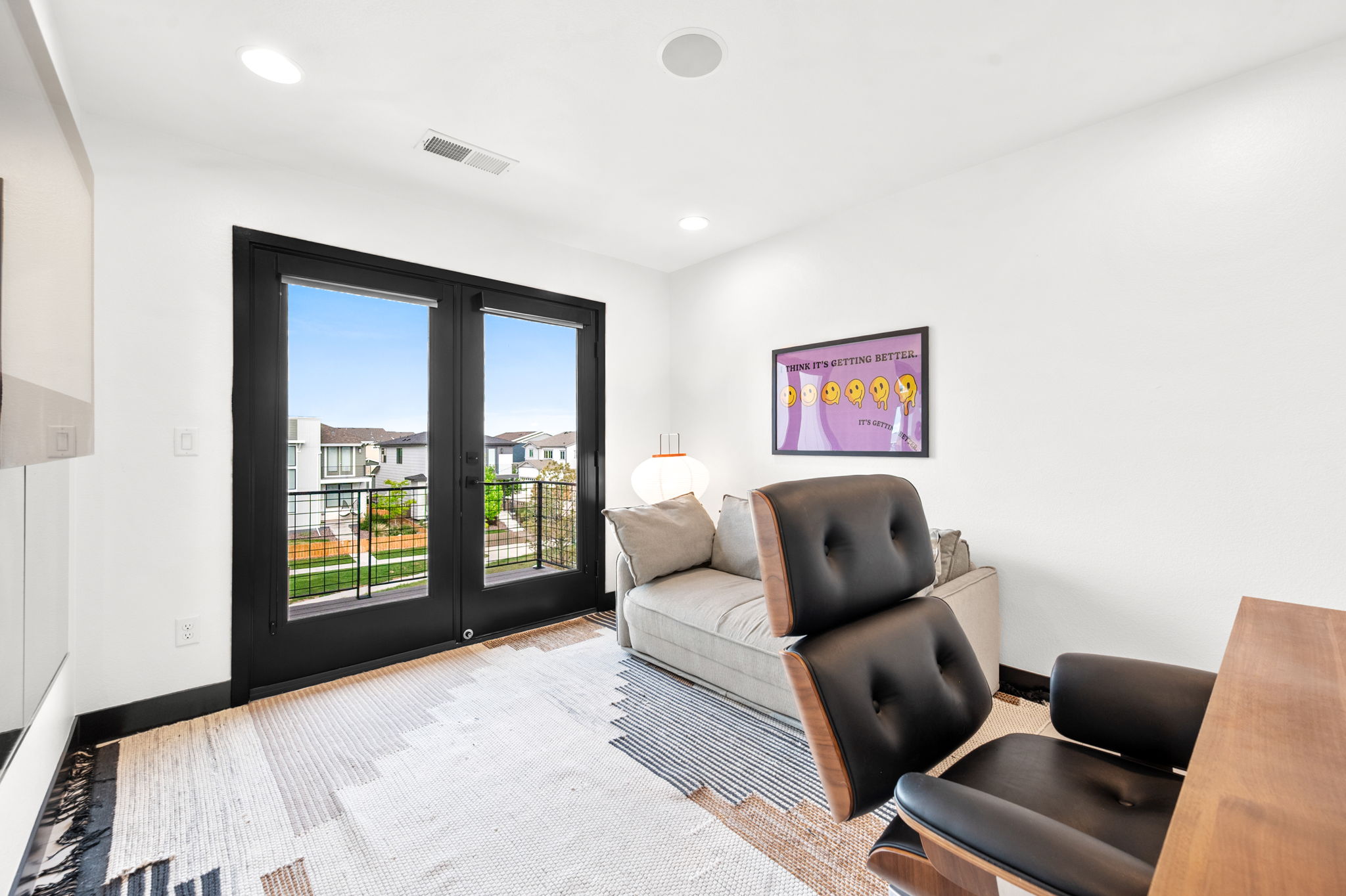 The private office includes a dedicated desk, balcony, and garden view. The teddy sofa also converts to a bed. 