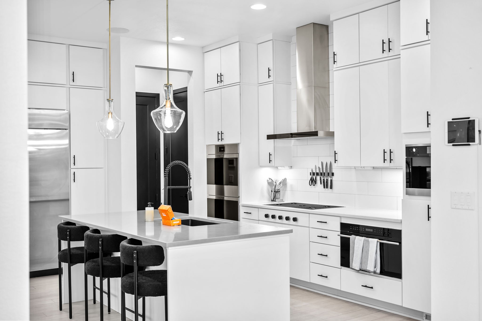 Whip up your favorite meals in this beautifully designed kitchen – includes breakfast bar seating for 3 and a Miele espresso maker