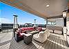 Enjoy a drink around the firepit or fire up the grill and pizza stove located on the rooftop balcony.